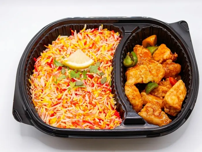Chicken schezwan with peppers and spiced rice