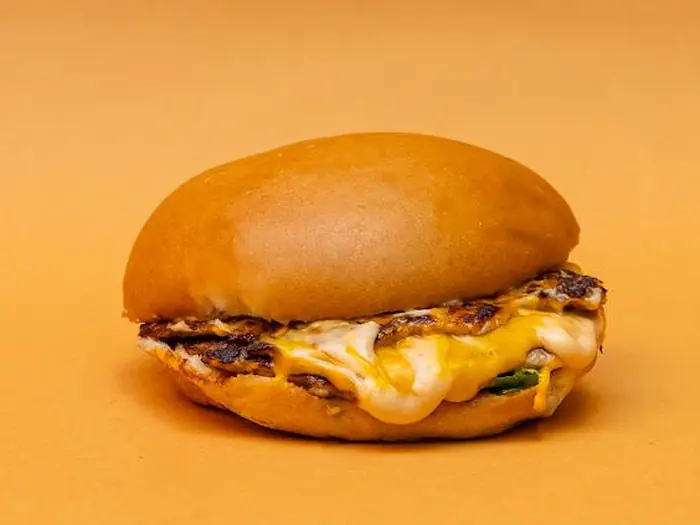 Double grilled chicken burger with melted cheese