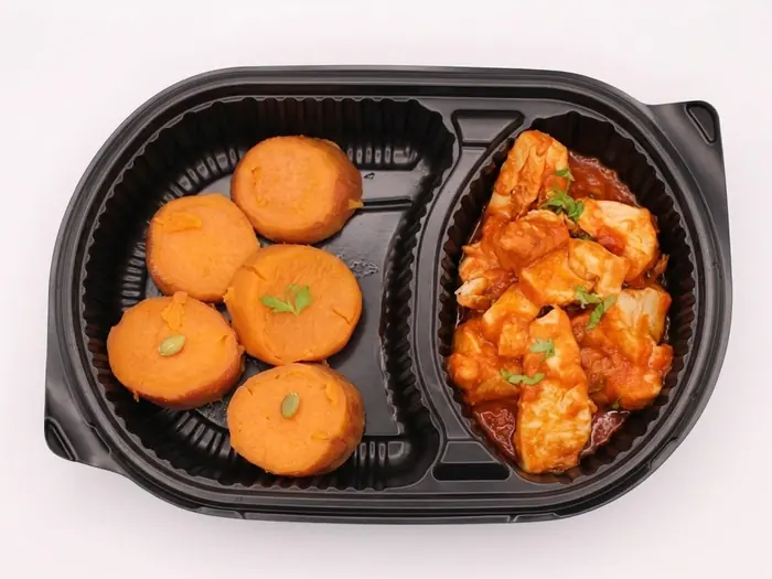 White fish simmered in tomato sauce with roasted sweet potato